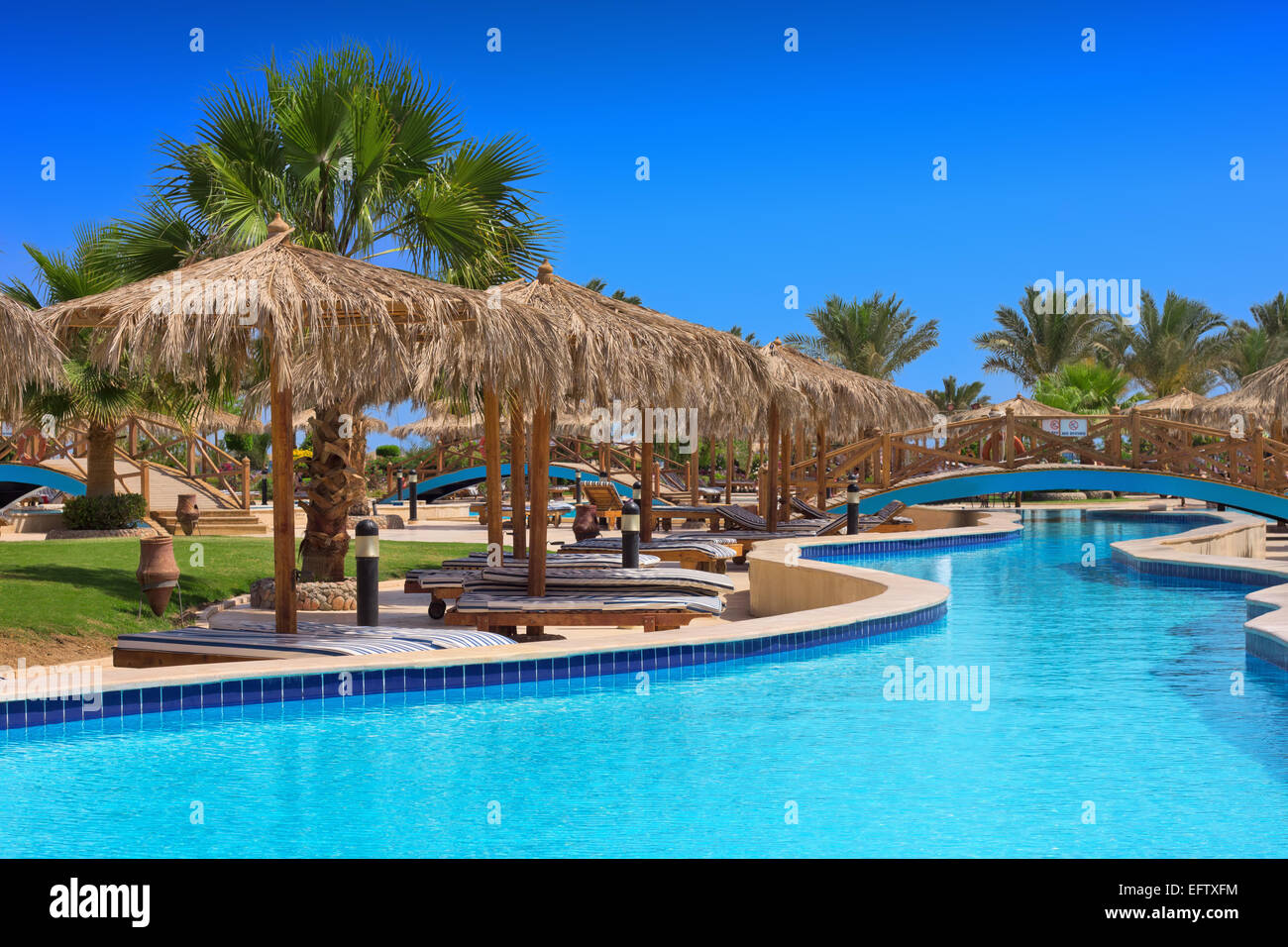 swimming pool at Hilton Long Beach Resort Hotel in Hurghada, Egypt Stock Photo