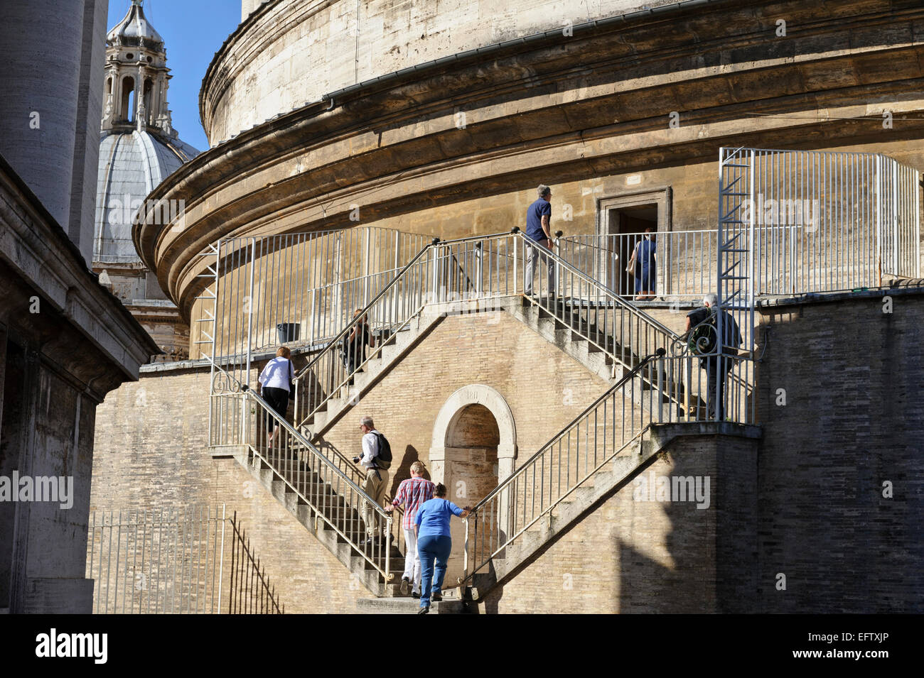 Tourists using the staircase to enter the small dome of the St Peter's