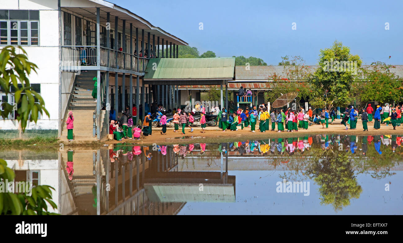School children wearing uniforms in the town Keng Tung / Kengtung, Shan State, Myanmar / Burma Stock Photo
