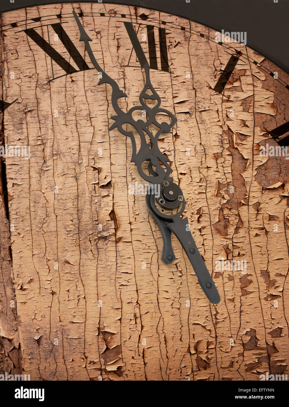 Rusty, textured, rough clock face showing 5 to midnight Stock Photo Alamy