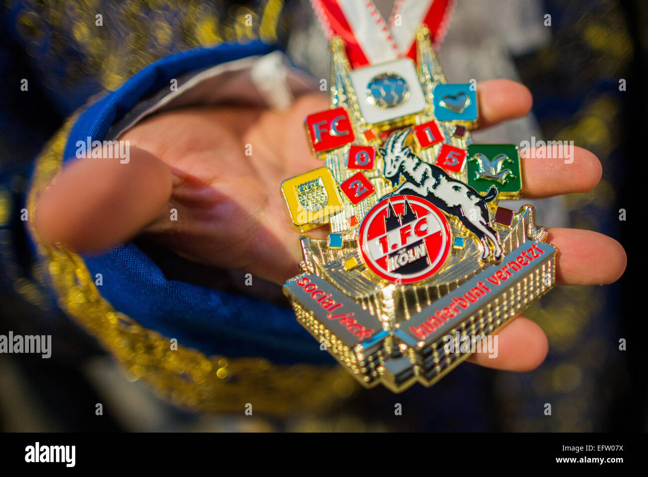 Cologne, Germany. 10th Feb, 2015. The medal of 1. FC Koel at a carnival meeting in Cologne, Germany, 10 February 2015. German Bundesliga football team 1. FC Koeln has invited carnival revelers to their annual meeting - this time, however, as a carnival club. Recently, the three-time German champions were registered as official promoters of the custom by the Cologne Carnival festival committee. Photo: RALF VENNENBERND/dpa/Alamy Live News Stock Photo