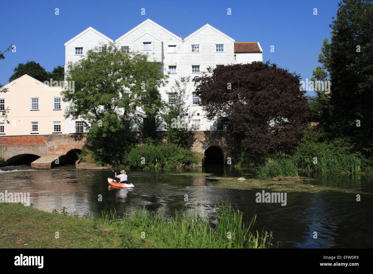 Picturesque water mill and canoeist / River Bure between Buxton and