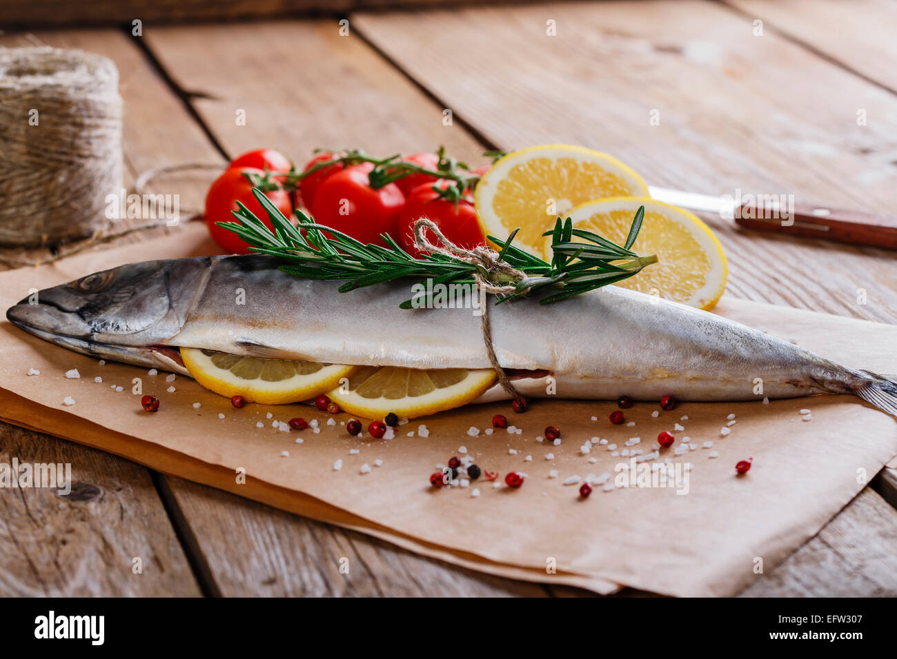 raw mackerel with lemon and spices Stock Photo