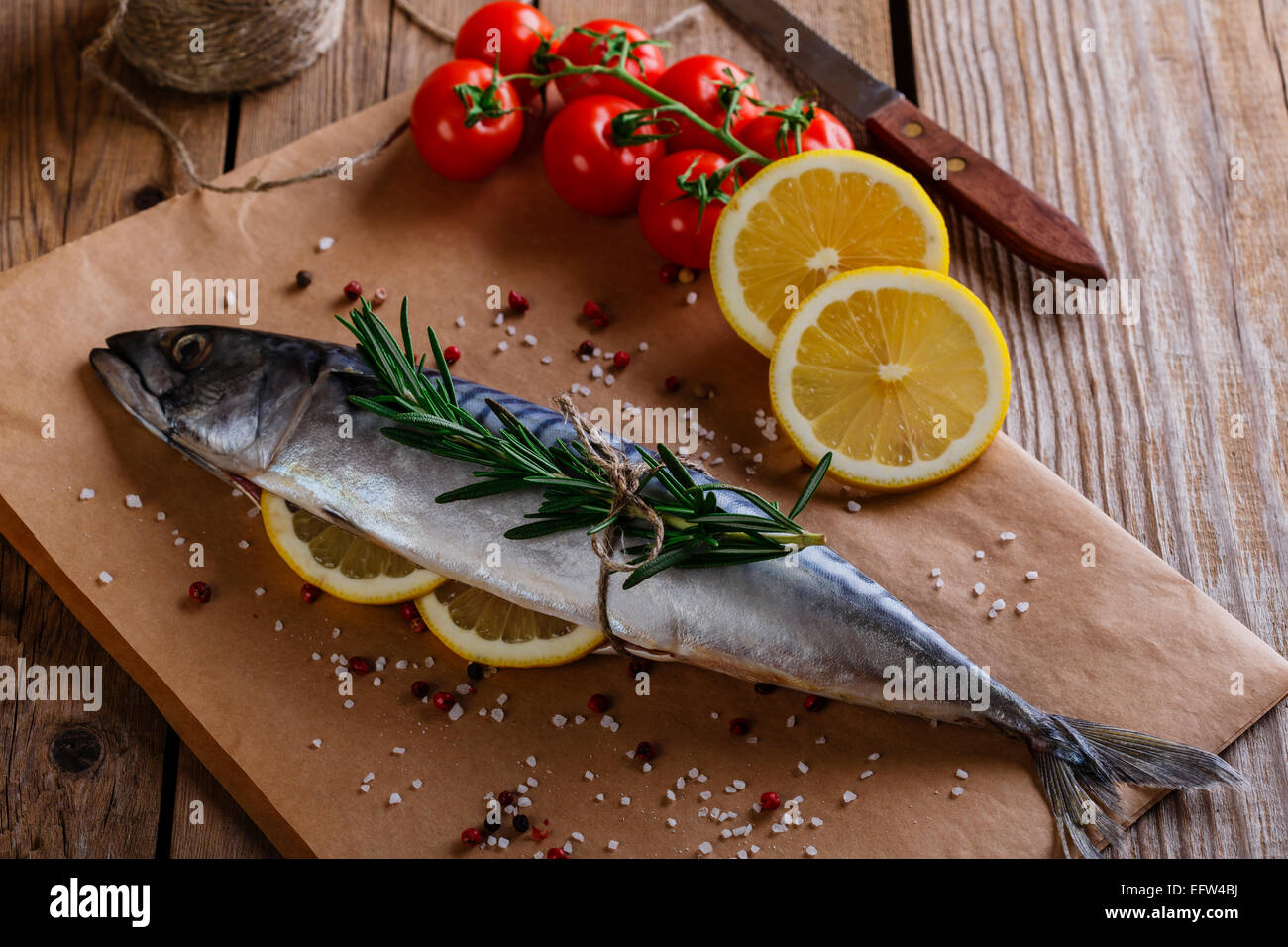 raw mackerel with lemon and spices Stock Photo
