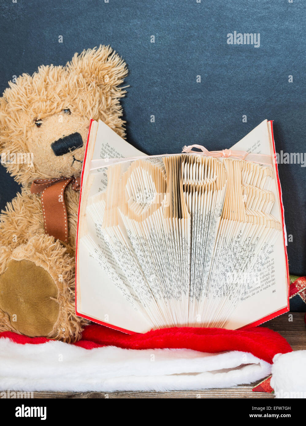 old bear and vintage old book Stock Photo - Alamy