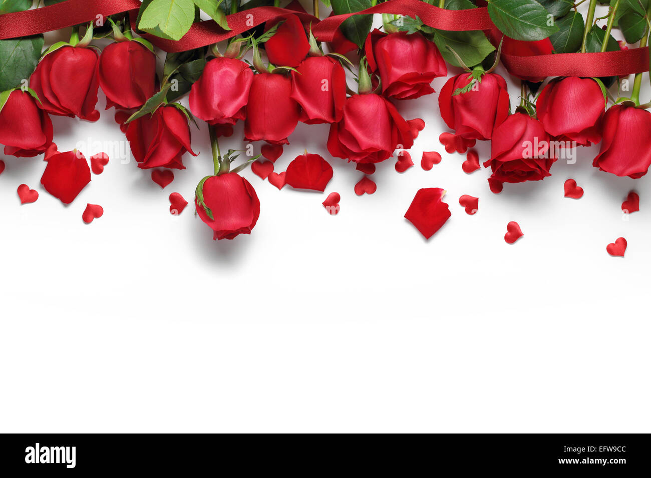 Red roses and heart shape ornaments on white background Stock Photo - Alamy
