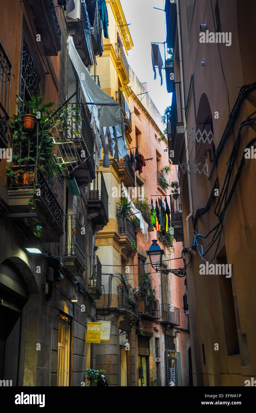Barcelona Spain colorful narrow street with buildings Stock Photo