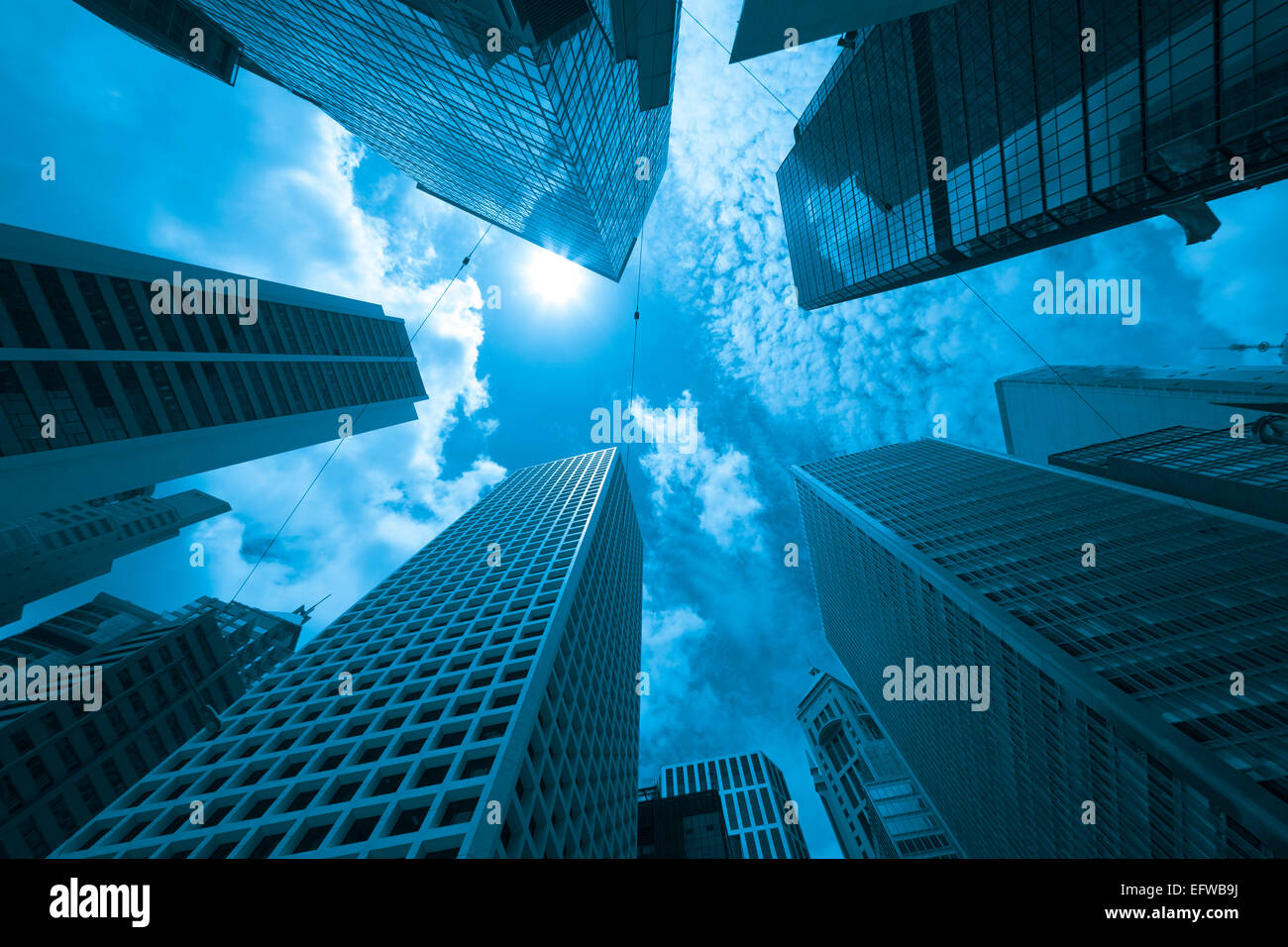 Modern buildings in a city, blue tone Stock Photo - Alamy