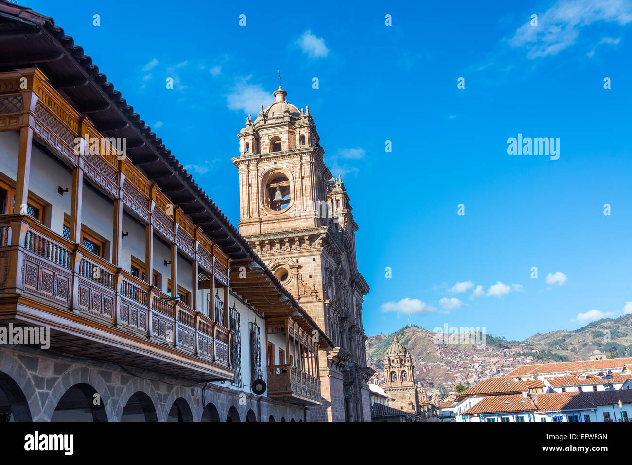 Colonial balconies and two churches on the Plaza de Armas in Cuzco, Peru Stock Photo