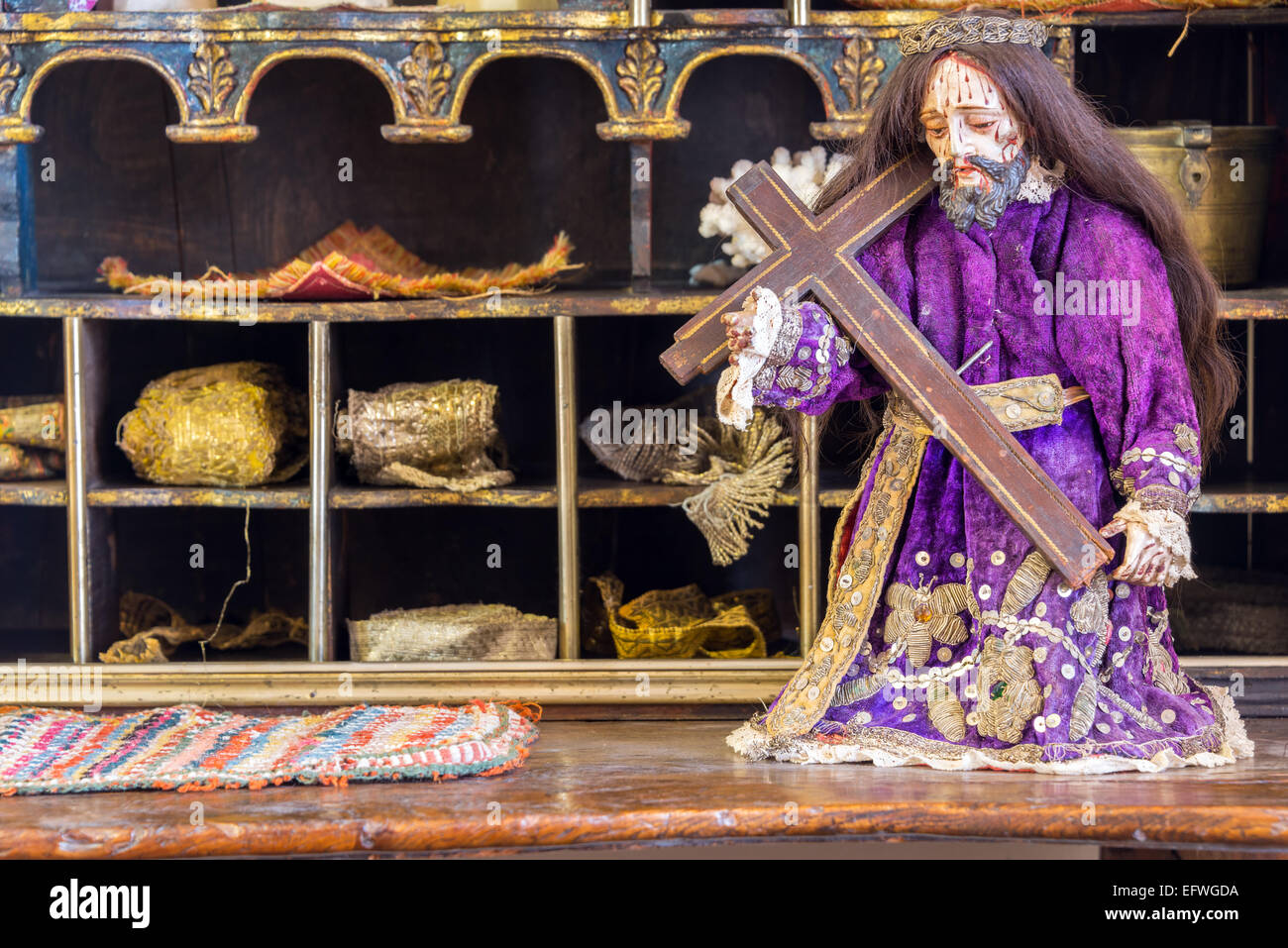 Historic statue of Jesus in a purple robe in Bolivia dating back to the  colonial period Stock Photo - Alamy