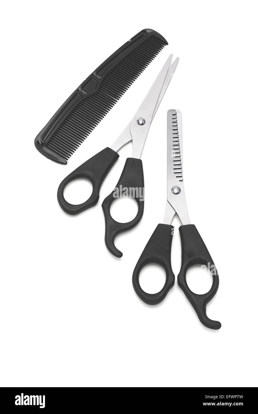 Comb and Scissors On White Background Stock Photo