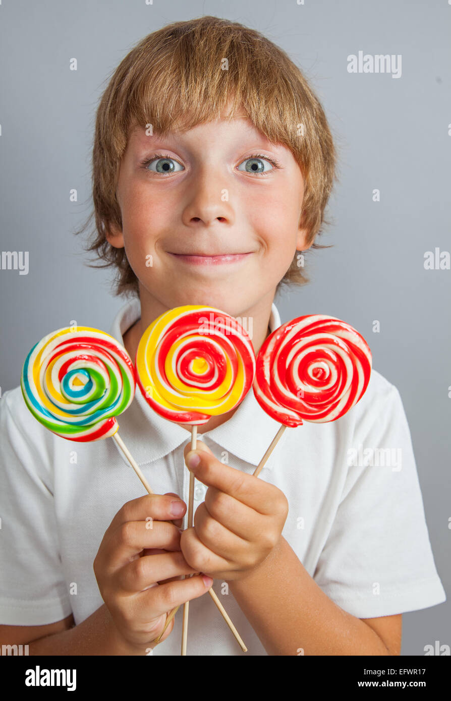 child boy eating lollipop Stock Photo