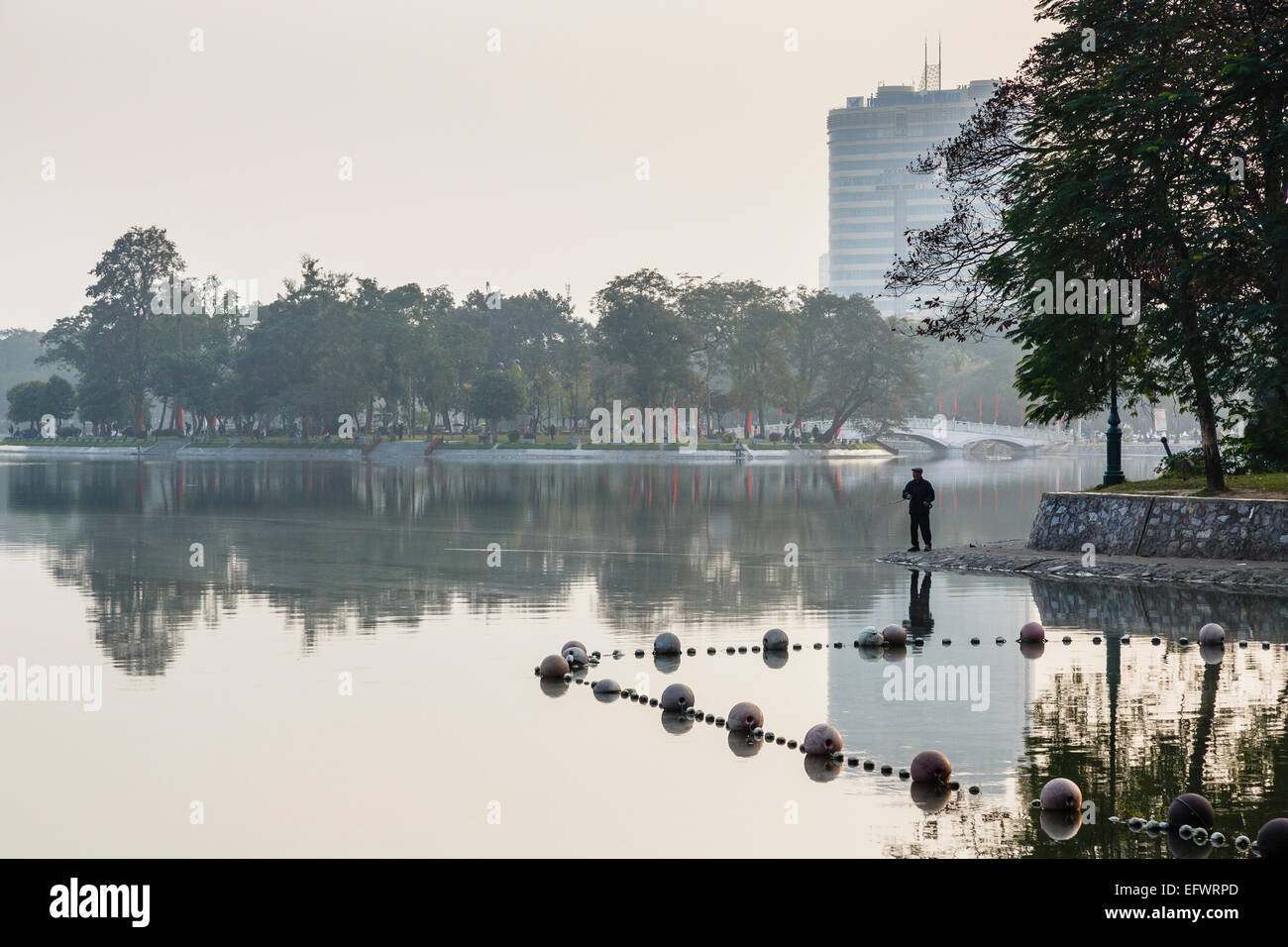 People fishing at the Bay Mau lake, Hanoi, Vietnam. Stock Photo