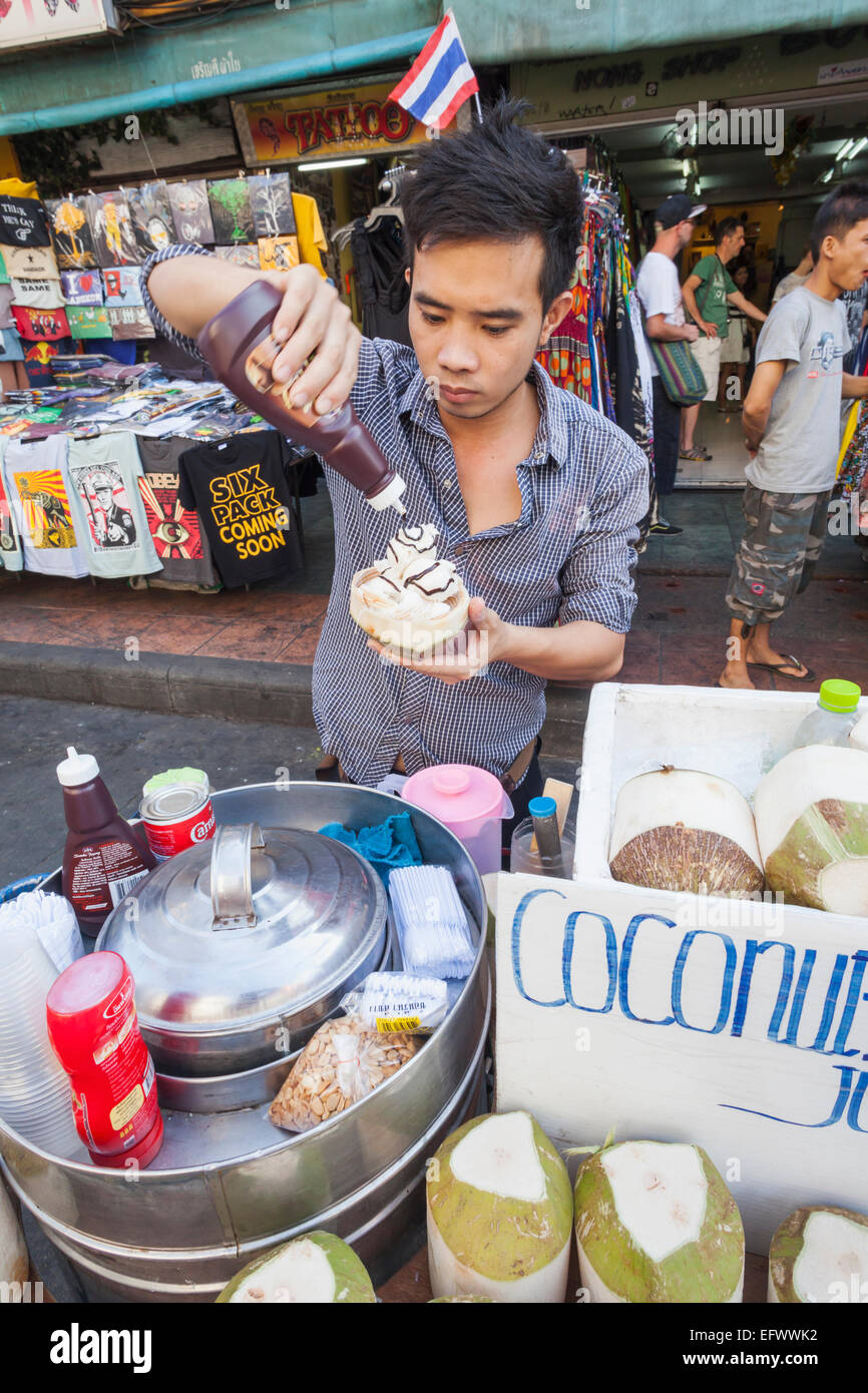 Thailand, Bangkok, Khaosan Road, Coconut Ice Cream Vendor Stock Photo