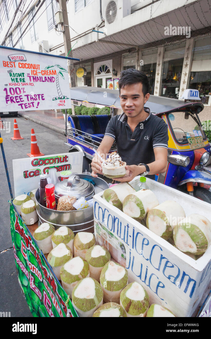 Thailand, Bangkok, Khaosan Road, Coconut Ice Cream Vendor Stock Photo