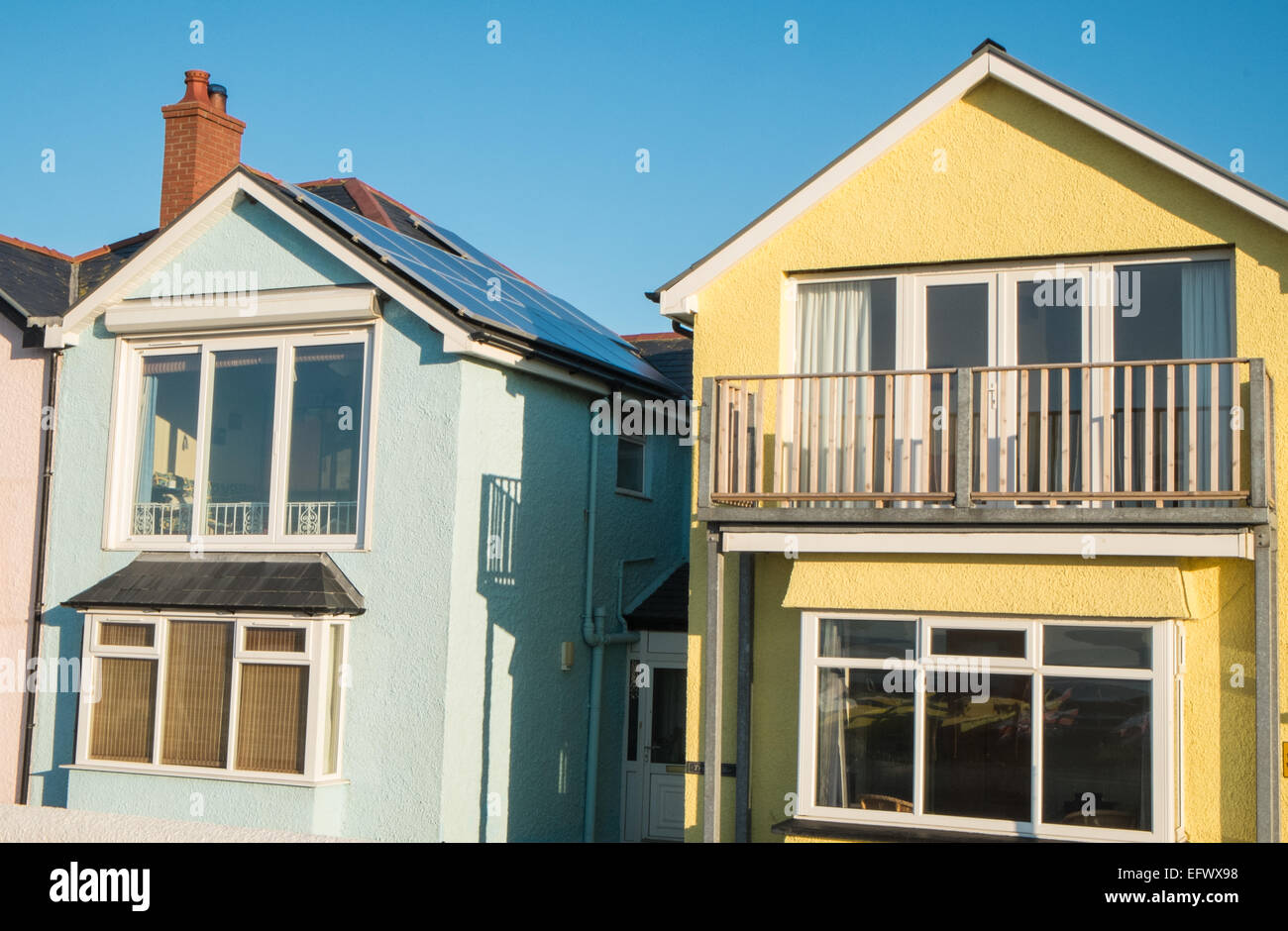 Colourfully painted houses on seafront at Borth, resort village north