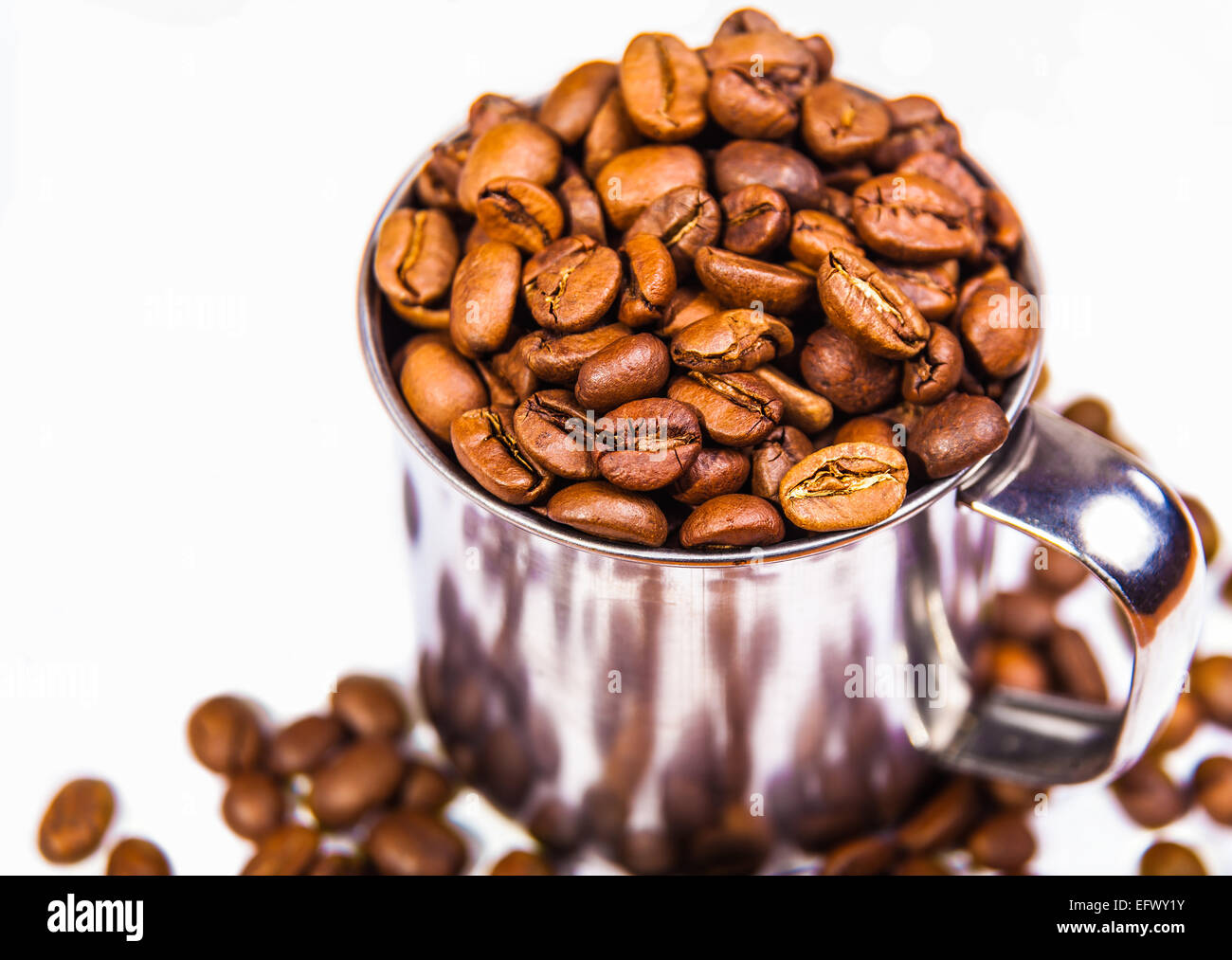 aromatic coffee beans in iron cup, closeup Stock Photo Alamy