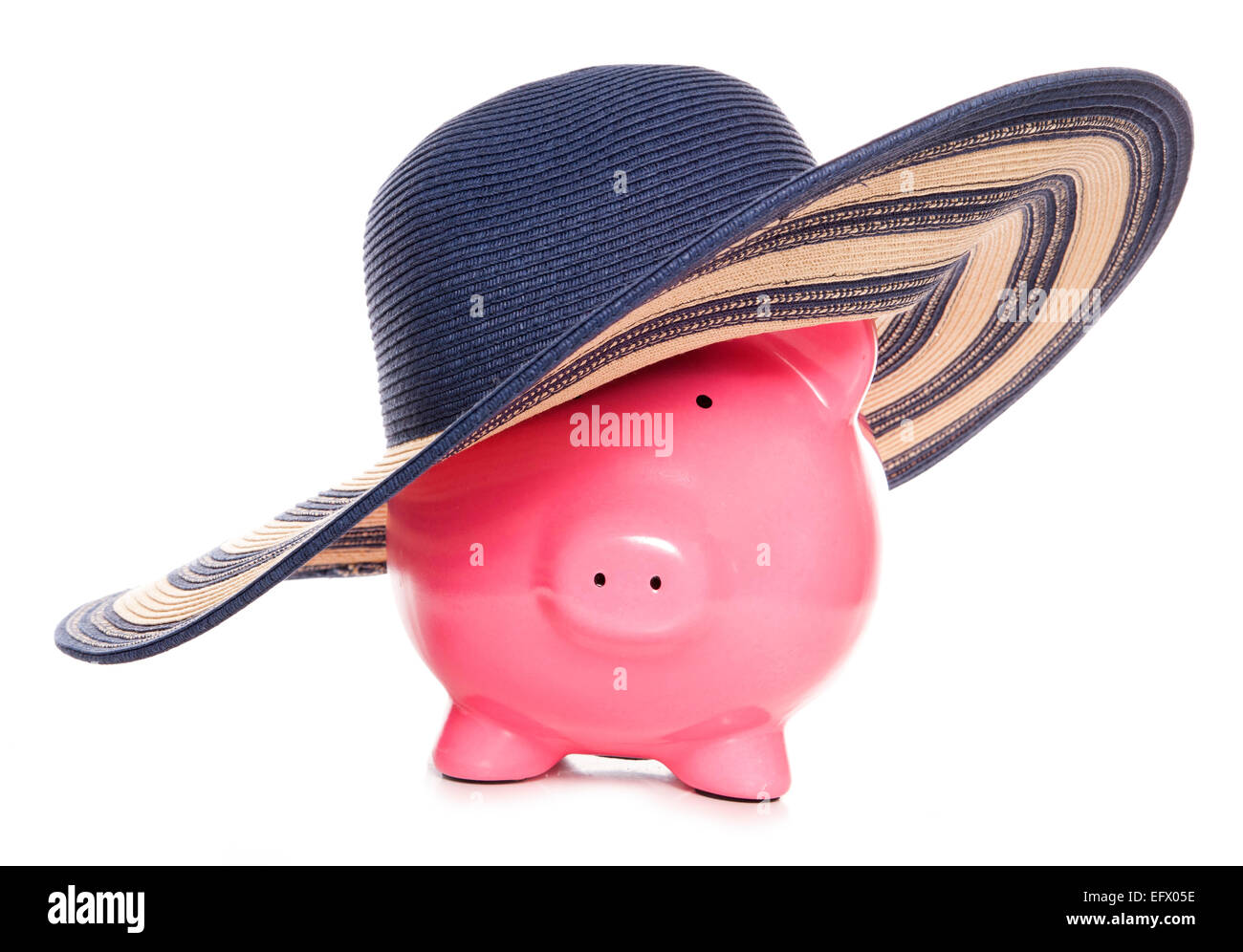 piggy bank wearing a summer hat cutout Stock Photo