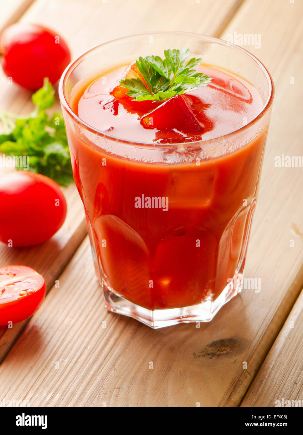 Tomato Cocktail with herbs and ice. Selective focus Stock Photo Alamy