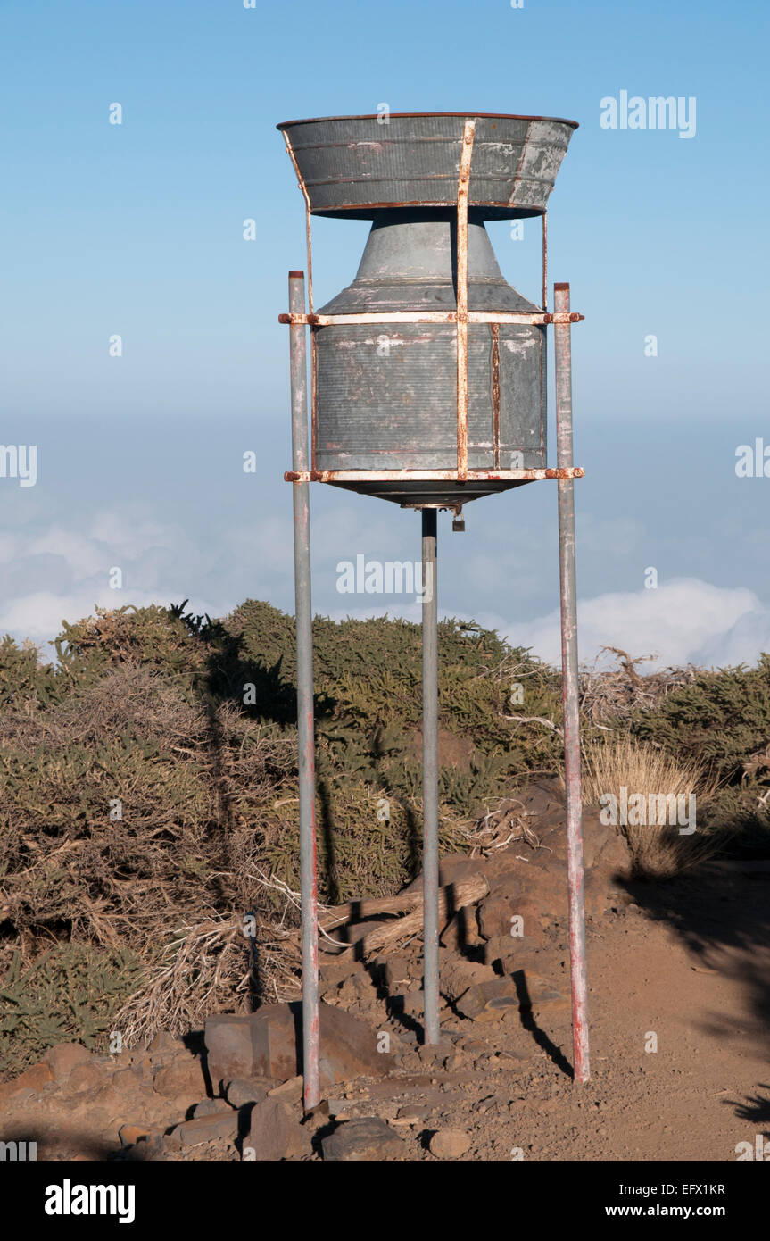 At more than 2300 m above sea level a rain gauge is collecting rain at the rim of the La Palma's caldera.  Auf dem Kraterrand de Stock Photo