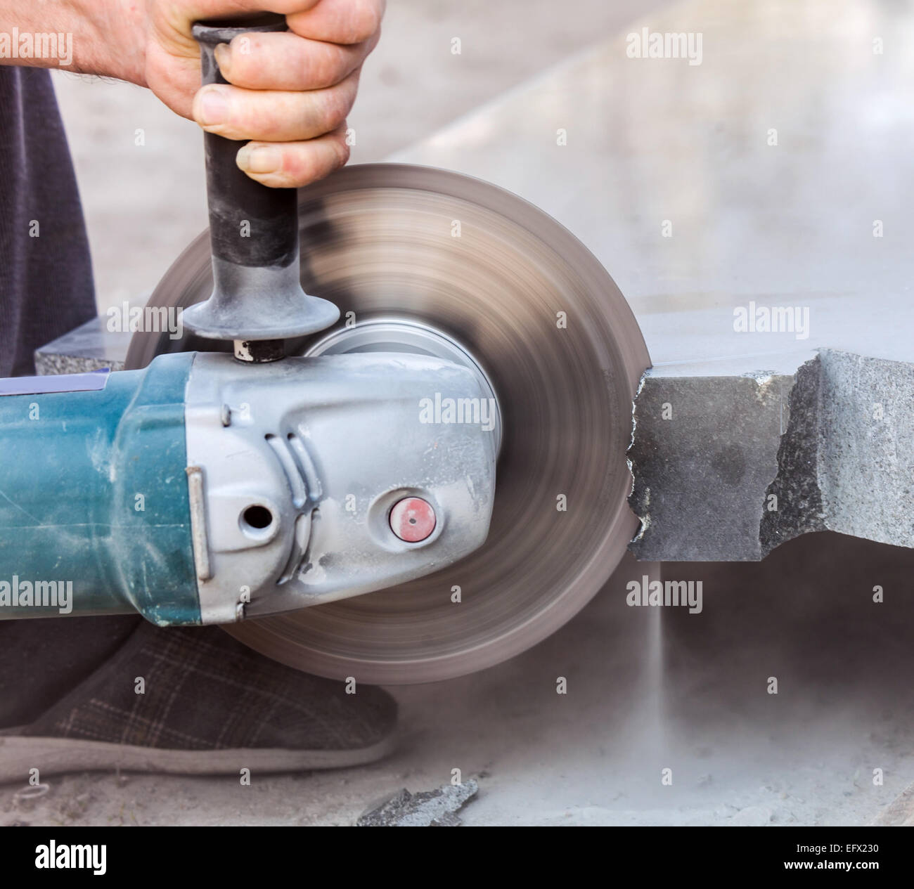 cutting hard stone grinder, handmade Stock Photo Alamy