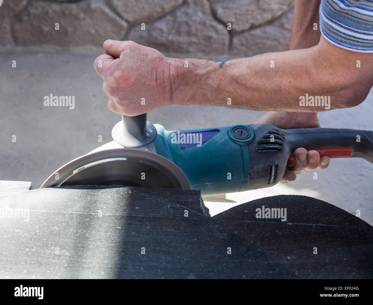 work grinders, machining and cutting granite Stock Photo Alamy