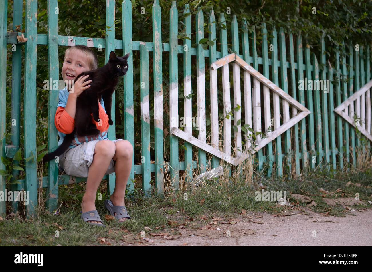 Russian boy with his cat. Stock Photo
