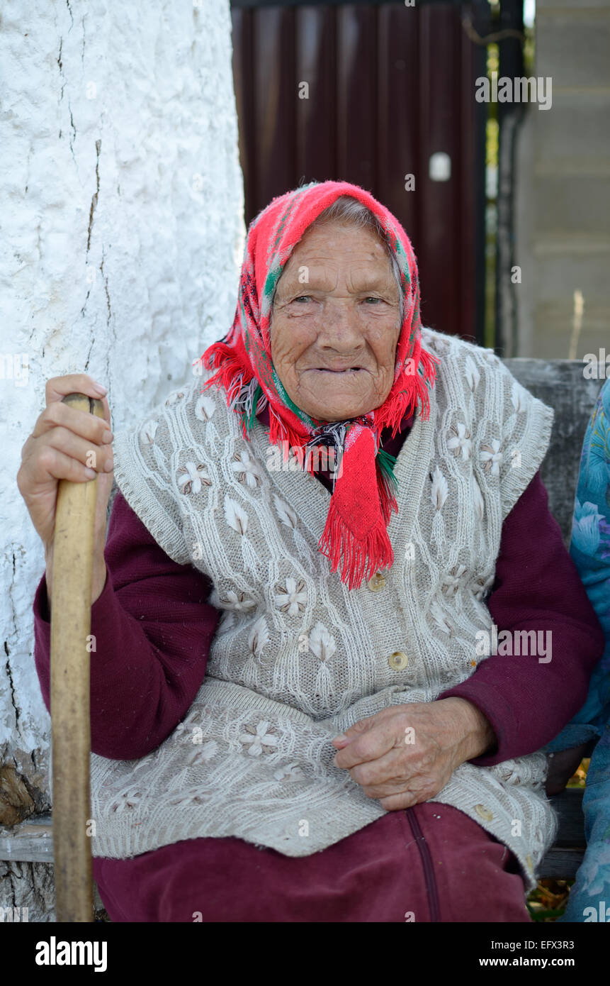 [Image: portrait-of-old-russian-woman-with-cane-EFX3R3.jpg]