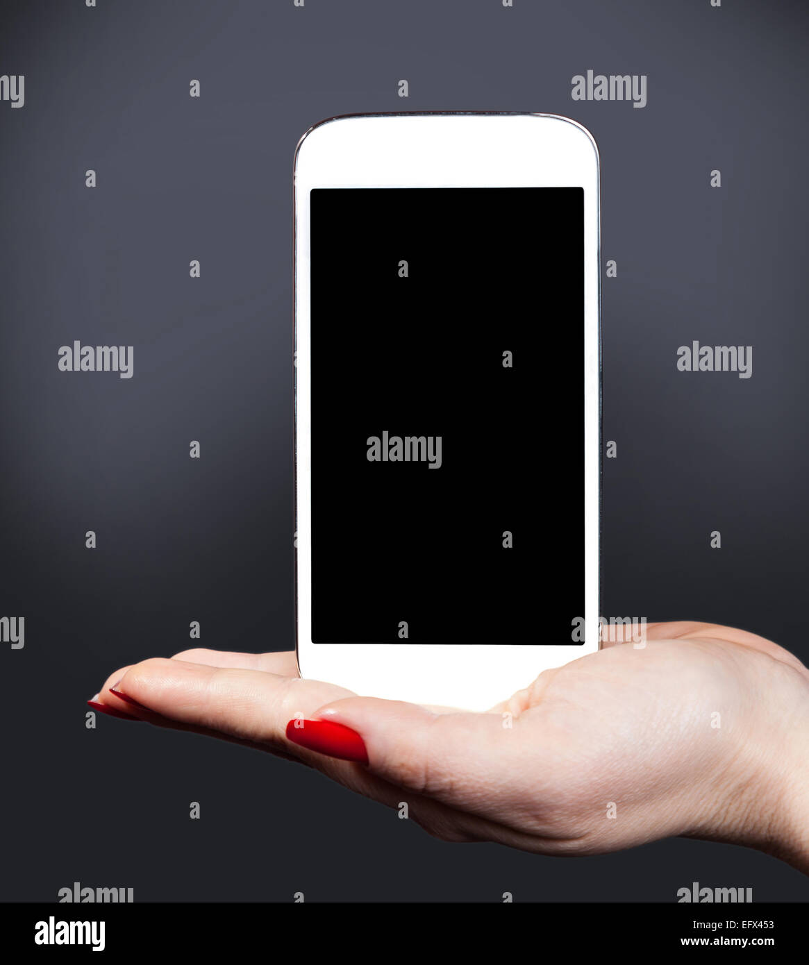 white smartphone on a female hand, the communication background Stock ...