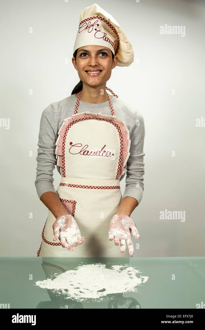 Portrait of a female chef processing food Stock Photo - Alamy