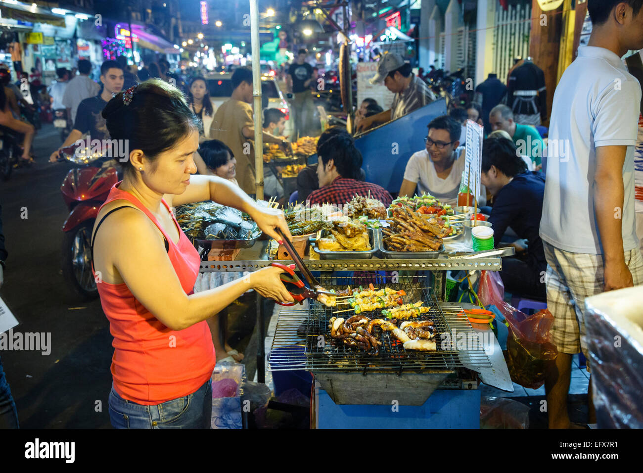Food stall at Bui Vien Street in Pham Ngu Lao District, Ho Chi Minh City (Saigon), Vietnam. Stock Photo