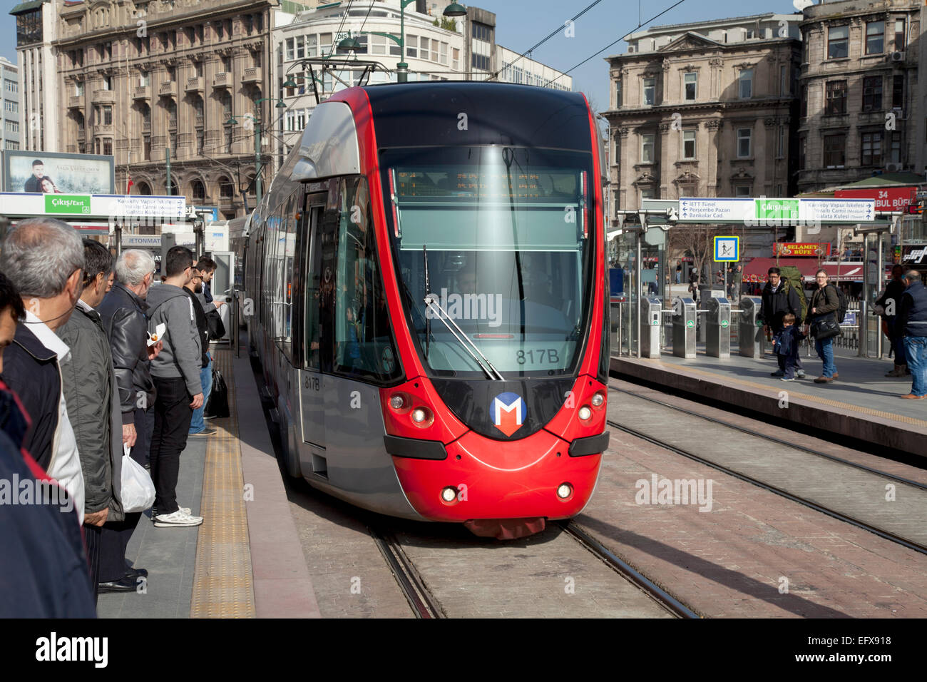 Modern tram, Karakoy, Istanbul, people waiting on platform Stock Photo