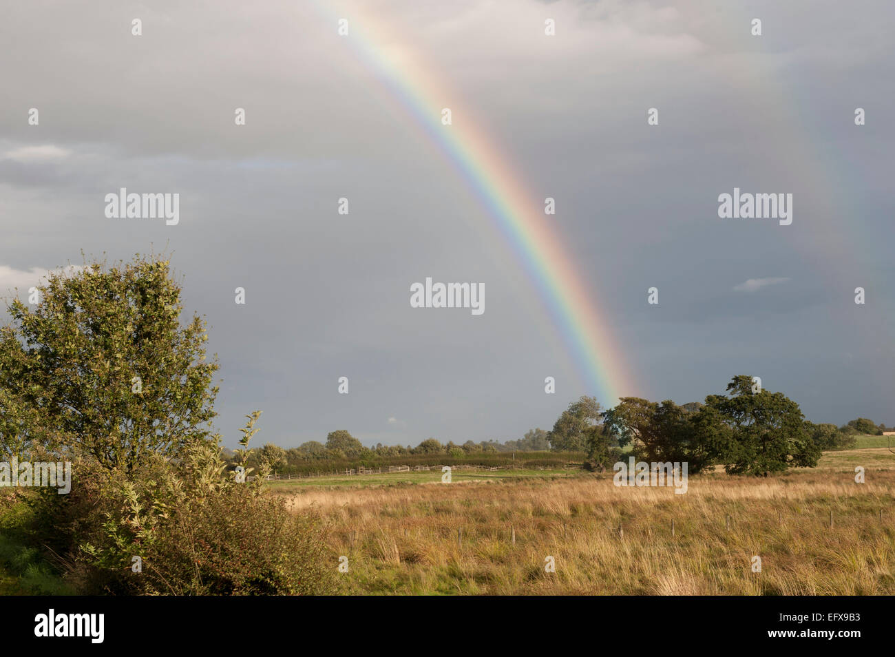 Sunshine with rainbow hires stock photography and images Alamy