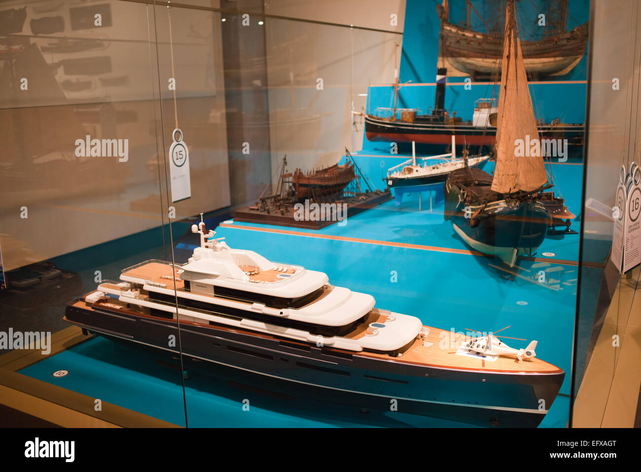 Ship models with large luxury yacht on the first plan in Rotterdam Maritime Museum, Holland, Netherlands. Stock Photo