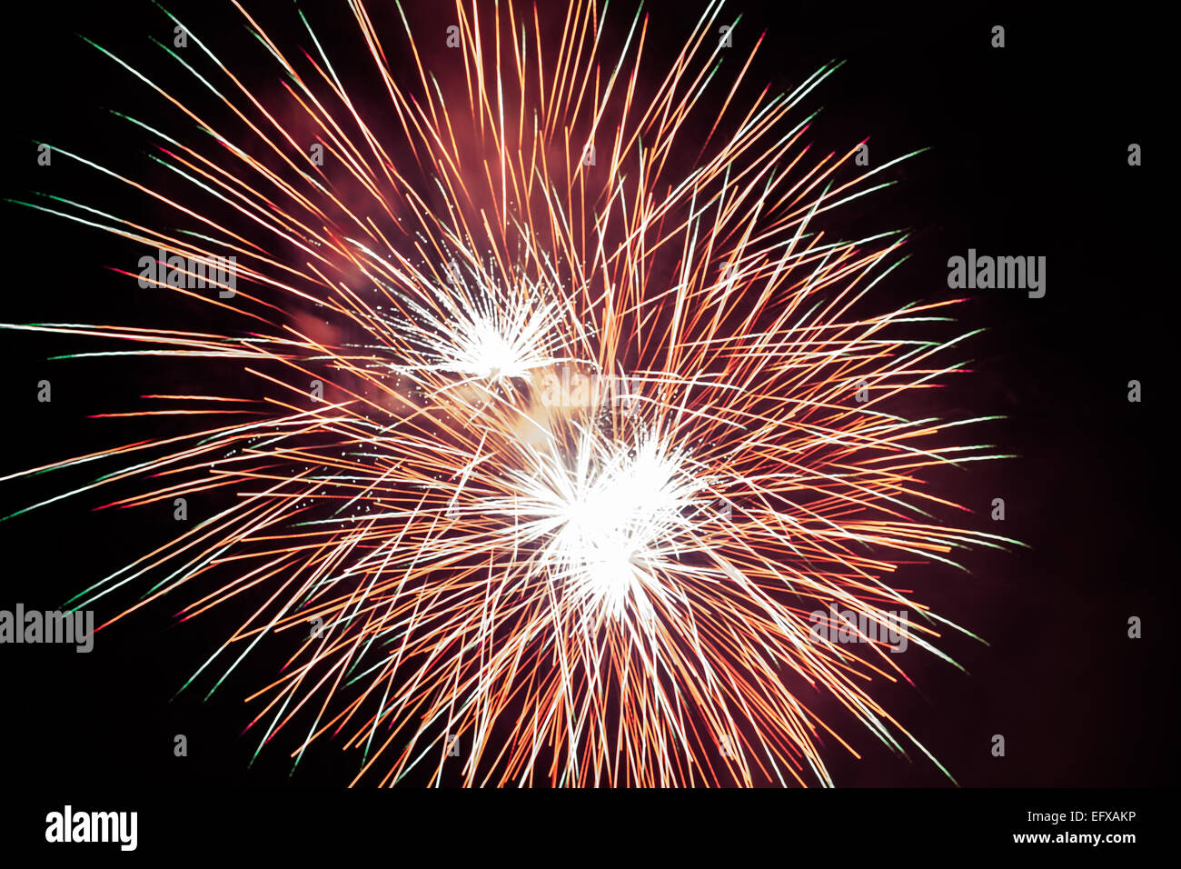 Beautiful firework against black sky Stock Photo