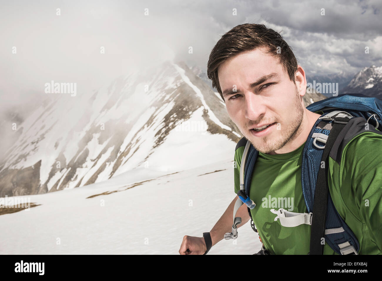Self portrait of young male mountain trekker in Bavarian Alps, Oberstdorf, Bavaria, Germany Stock Photo