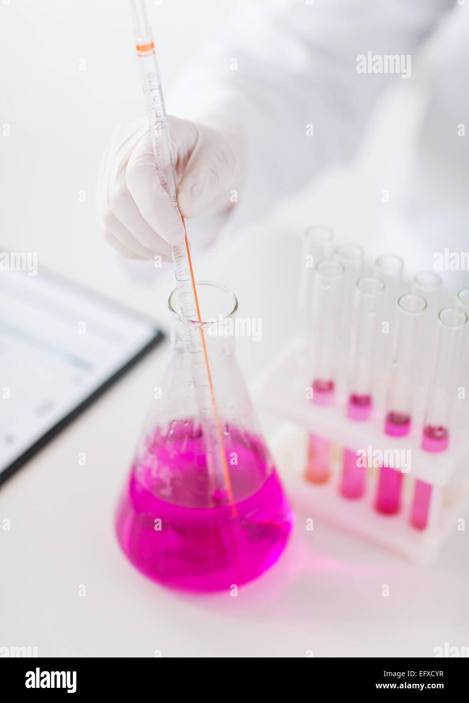 Female scientist test tubes hi-res stock photography and images - Alamy