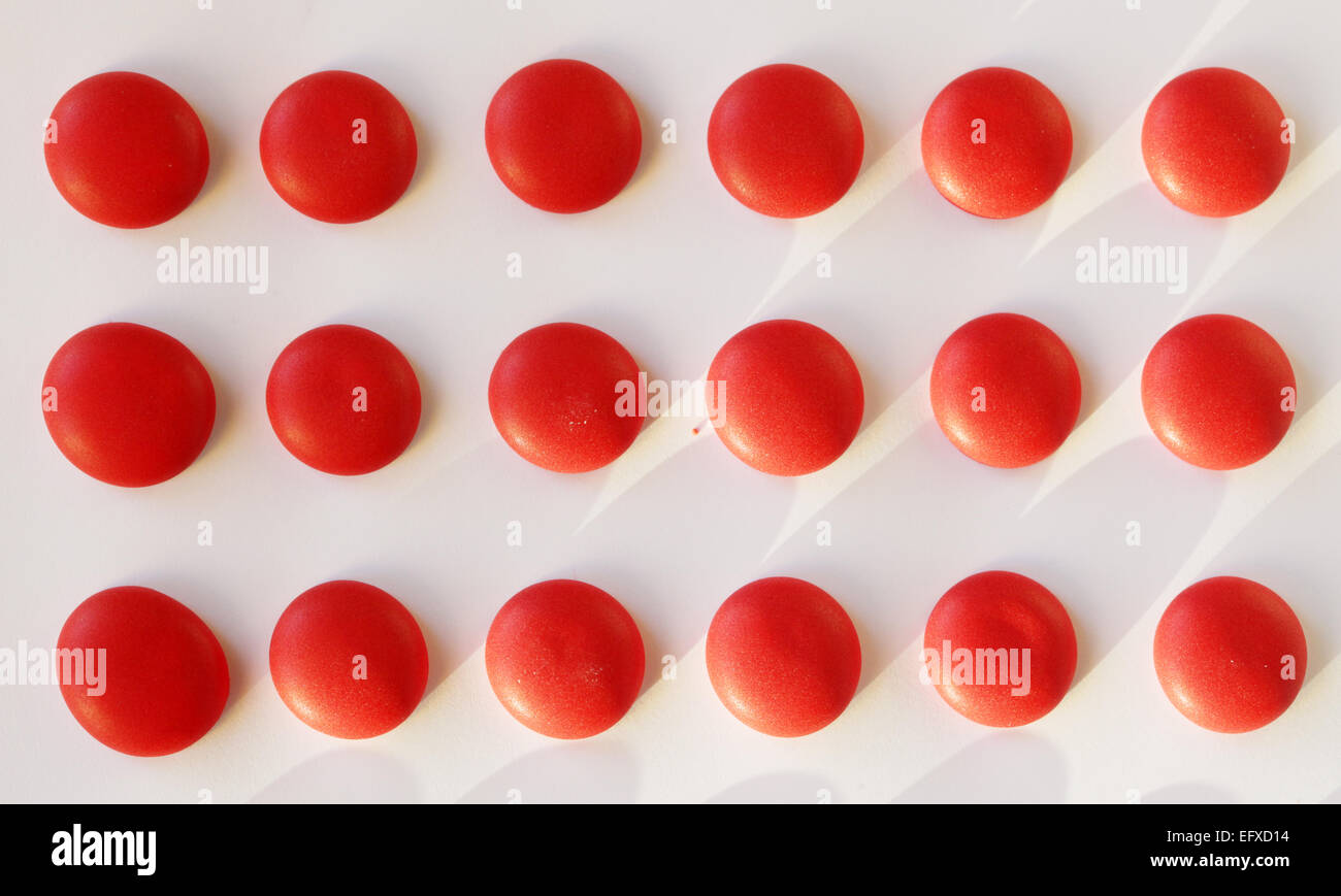 dot candies on strip of paper Stock Photo Alamy