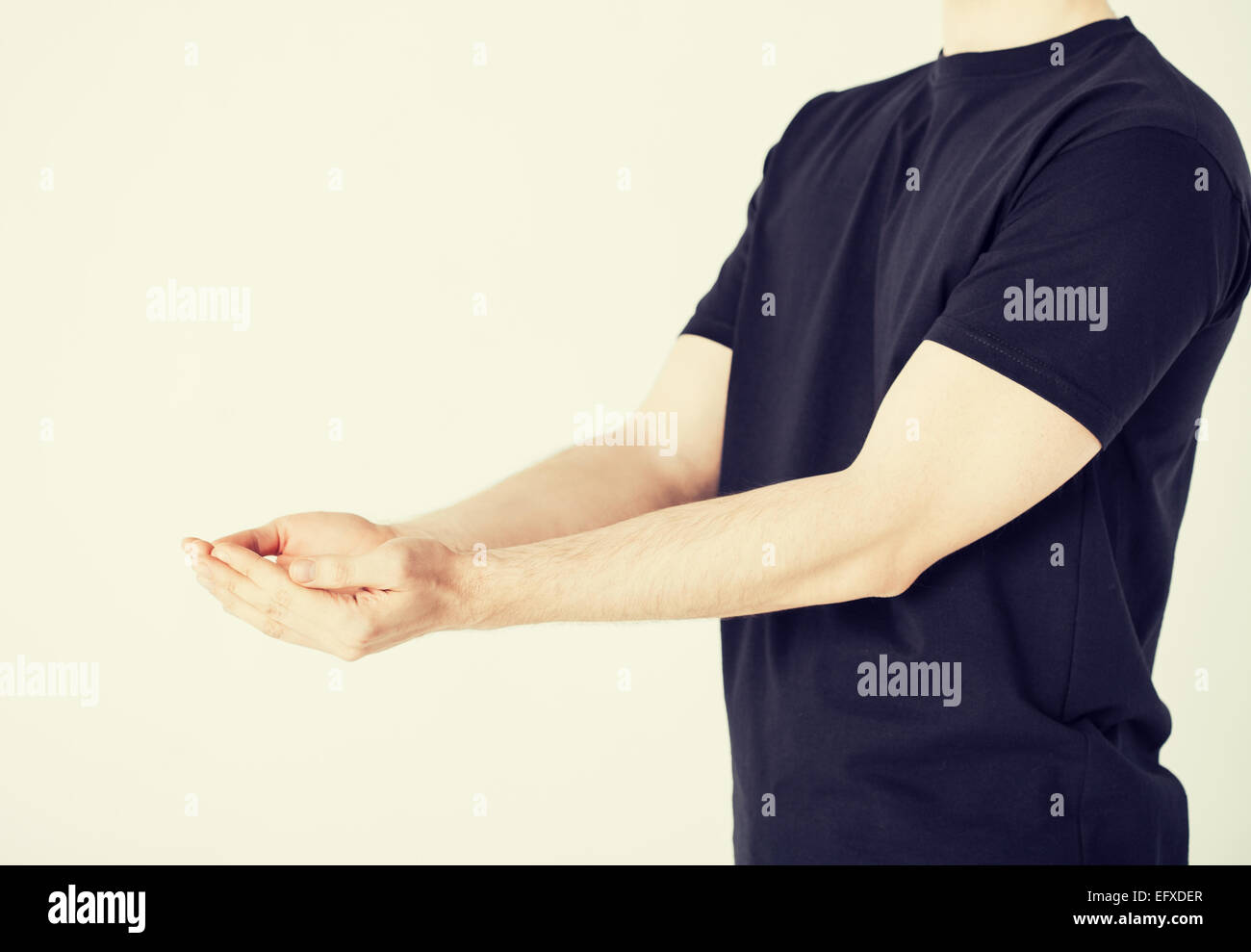 mans hands showing something Stock Photo