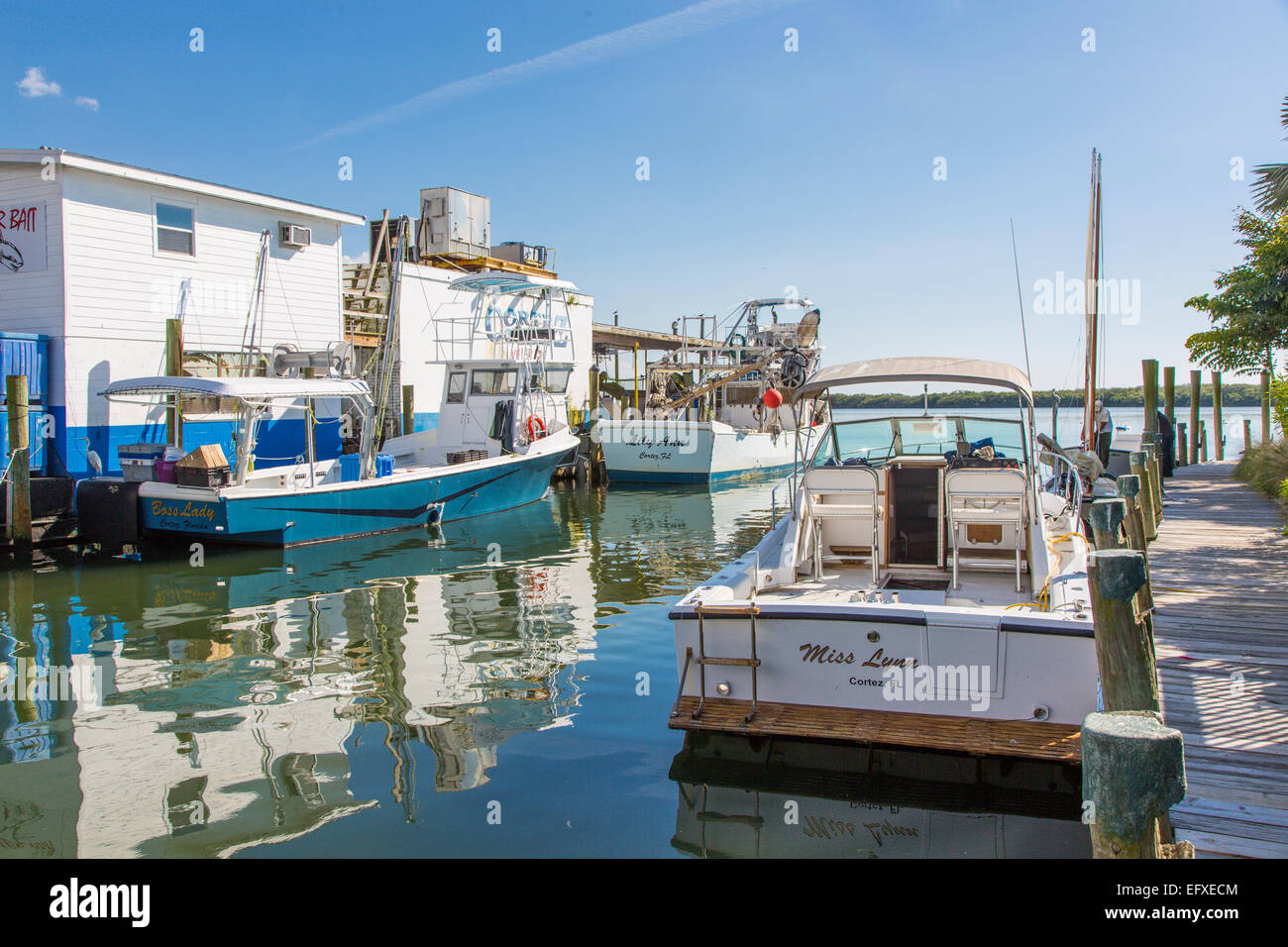 commercial net fishing in sarasota bay Fishing boats in old historic commercial fishing village of Cortez on Sarasota  Bay in Florida Stock Photo
