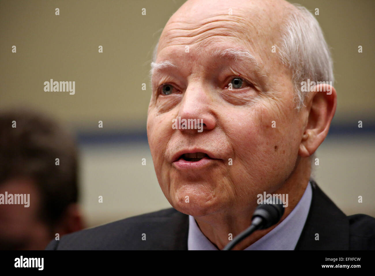 IRS Commissioner John Koskinen testifies at the House Oversight and Government Reform Committee hearing on the IRS targeting of political groups on Capitol Hill March 26, 2014 in Washington, DC. Stock Photo
