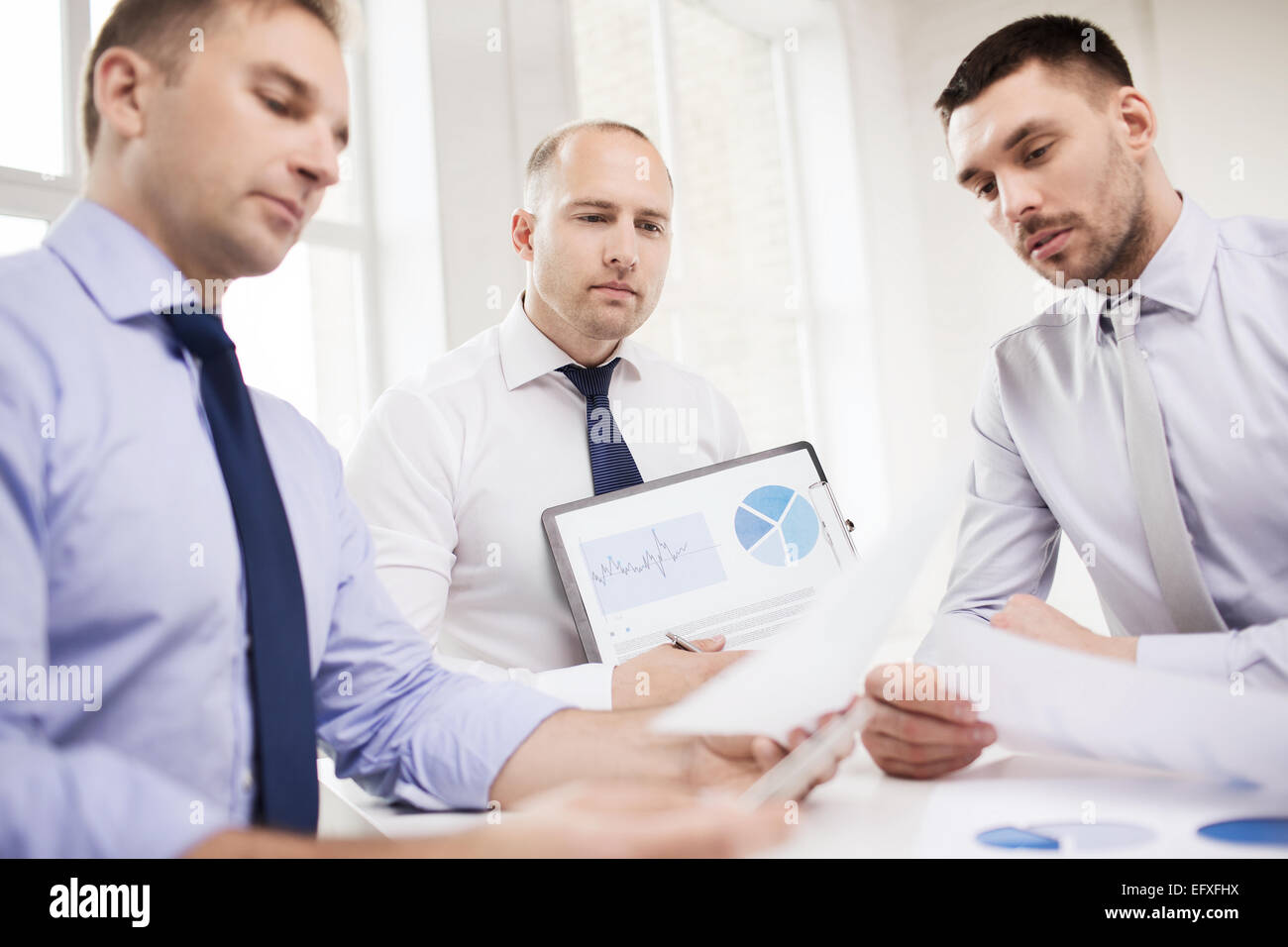 Group successful businessmen in hi-res stock photography and images - Alamy