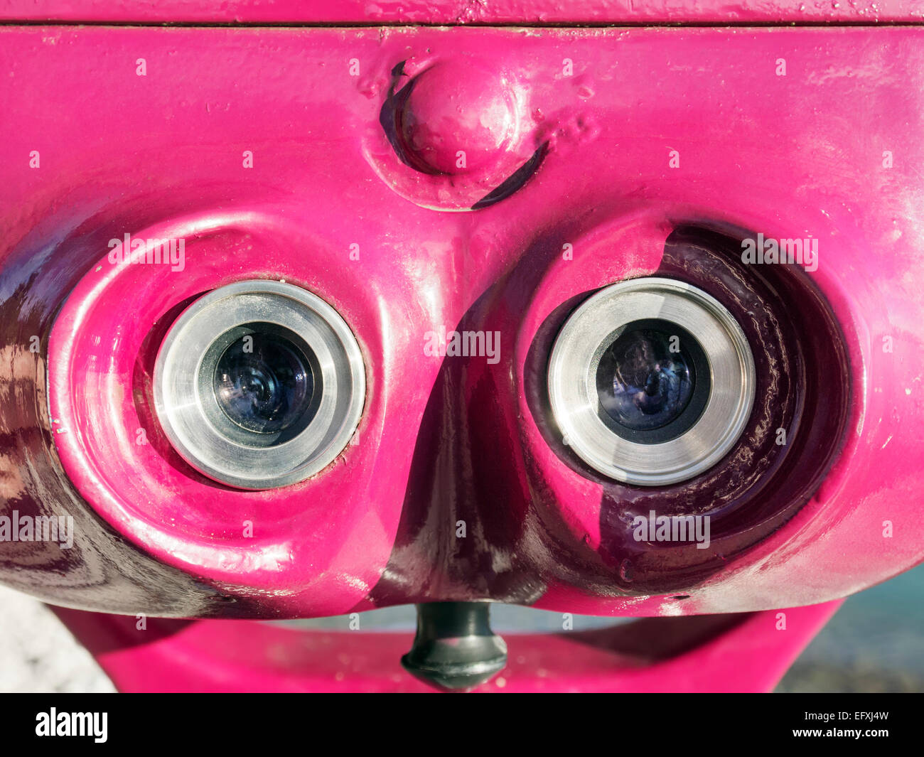 Closup of the ocular of a pink telescope Stock Photo
