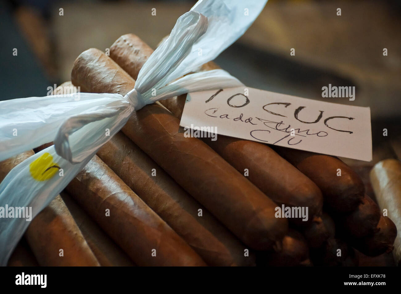Horizontal view of a pile of Cuban cigars for sale. Stock Photo