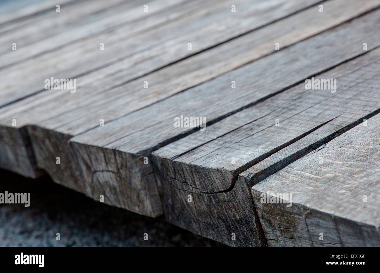 Close up of wooden planks on elevated walkway Stock Photo