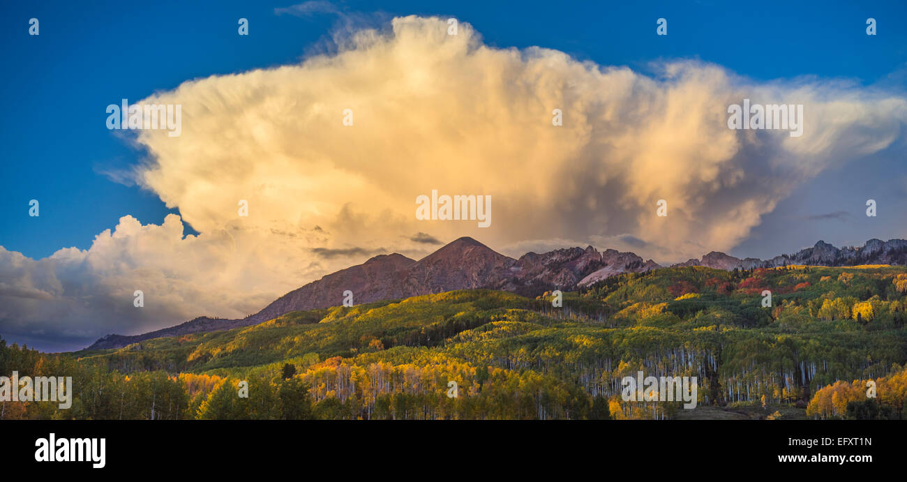 Gunnison National Forest, CO: Billowing clouds over the Ruby Range in early fall Stock Photo