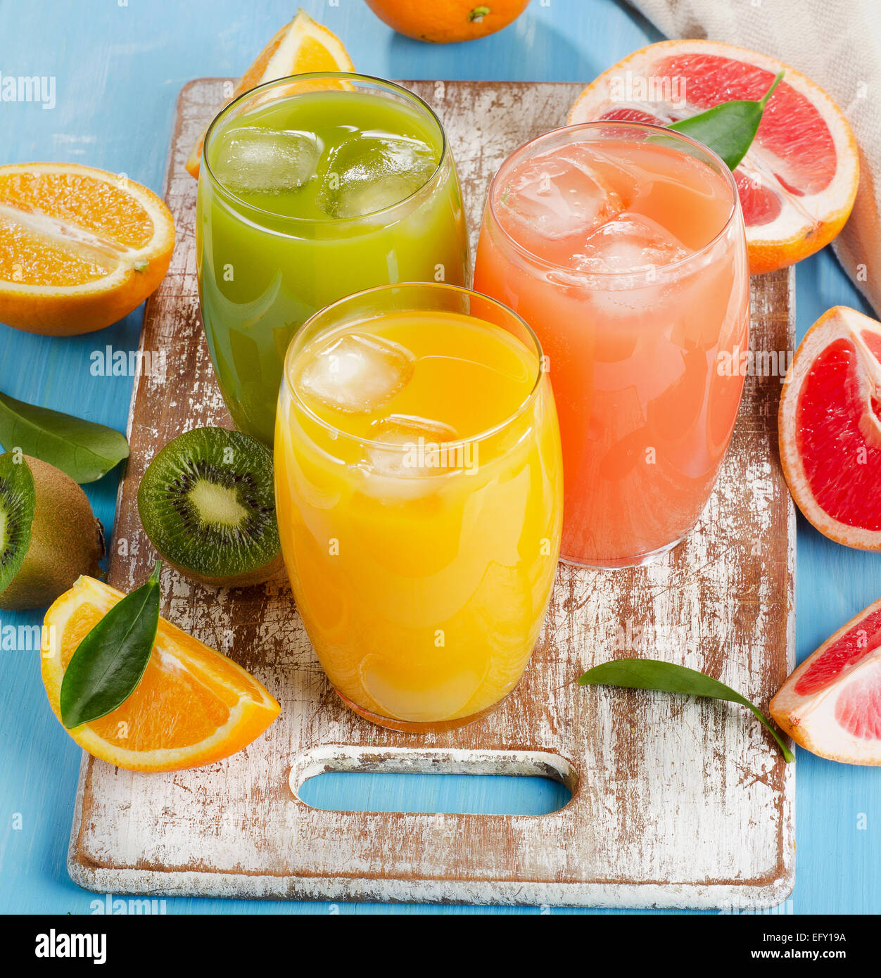 Citrus juice   on a wooden background. Selective focus Stock Photo