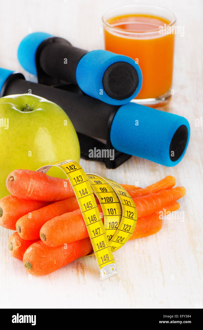 fitness equipment and fresh healthy food - health and diet concept. Selective focus Stock Photo