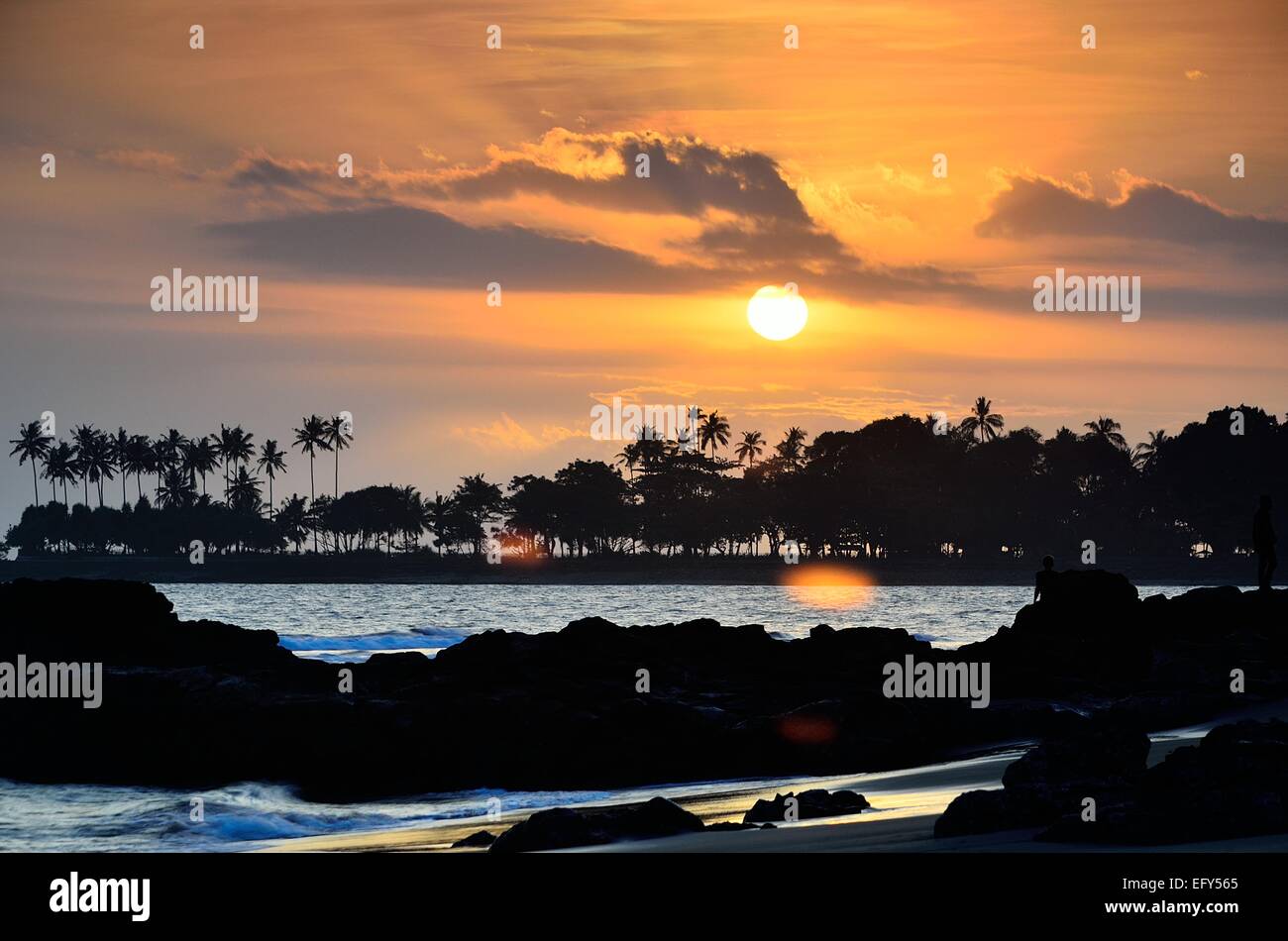 Beautiful Sunset in Senggigi of Lombok in Indonesia. The island of surfer. Stock Photo