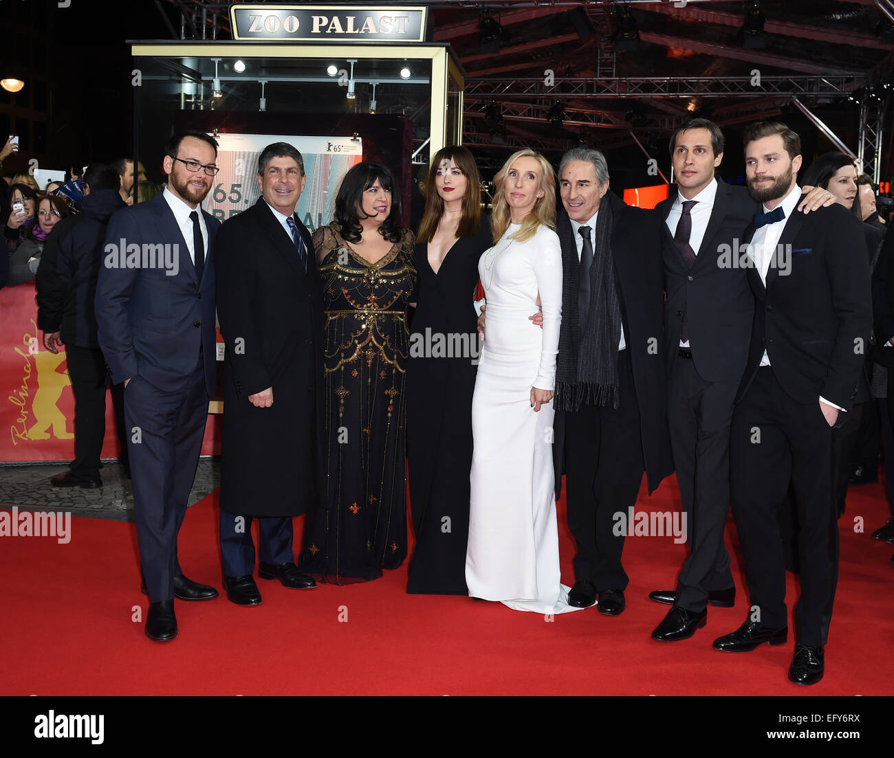 Berlin, Germany. 11th Feb, 2015. Producer Dana Brunetti (l-r), a guest, bestselling author E.L. James, actress Dakota Johnson, director Sam Taylor-Johnson and producer Marcus Viscidi, a guest, and actor Jamie Doran arrive at the world premiere of the film 'Fifty Shades of Grey' during the 65th annual Berlin Film Festival, in Berlin, Germany, 11 February 2015. The movie is presented out of competition at the Berlinale, which runs from 05 to 15 February 2015. Photo: Britta Pedersen/dpa (recrop)/dpa/Alamy Live News Credit:  dpa picture alliance/Alamy Live News Stock Photo